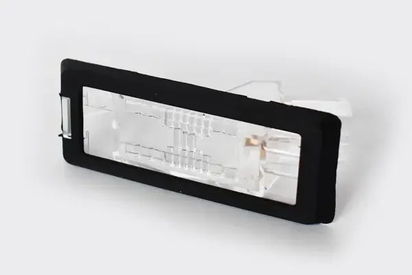  Фонарь подсветки номерного знака Renault Modus 