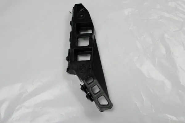 Кронштейн бампера переднего правый 1K8807184B VAG