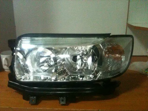 Левая фара 84001SA494 Subaru