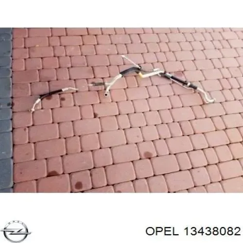 Шланг кондиционера, от радиатора к испарителю 13438082 Opel