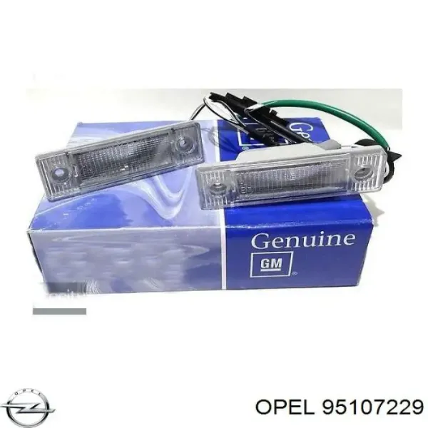 Фонарь подсветки номерного знака 95107229 Opel