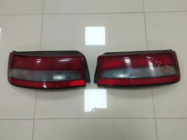 Фонарь задний левый 8FB351160 Mazda
