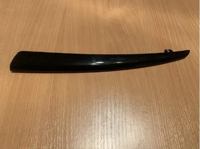 Молдинг решетки радиатора левый MAZDA GHP950B51A