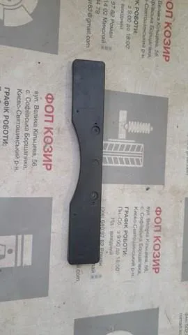 Панель крепления номерного знака переднего TOYOTA 5211433500