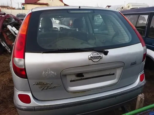 Задний бампер Nissan Almera TINO