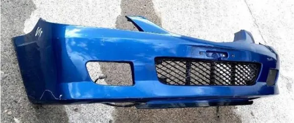 Передний бампер B30K50031 Mazda