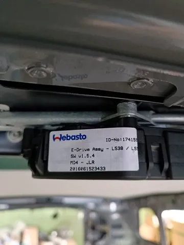 Мотор привода люка LR128434 Land Rover