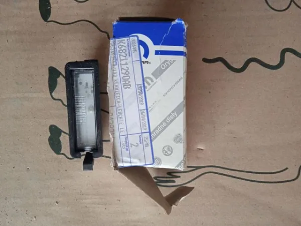 Фонарь подсветки номерного знака K68211290AB Fiat/Alfa/Lancia
