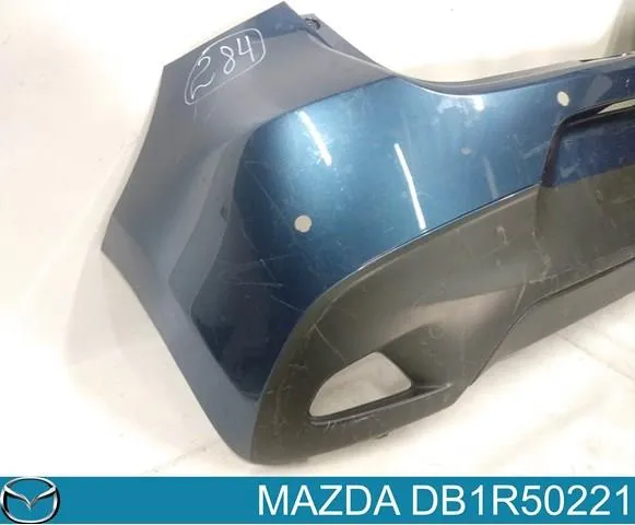 Задний бампер DB1R50221 Mazda
