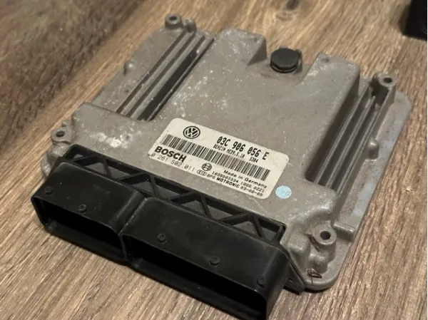 Блок управления двигателем 03C906056E VAG