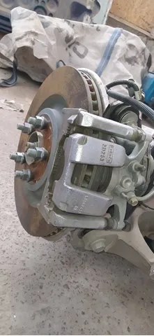 Суппорт задний левый L1MZ2553E Ford
