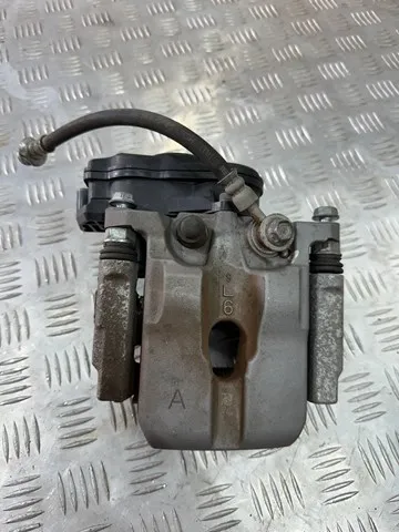 Суппорт задний левый D40106RA0A Nissan/Infiniti
