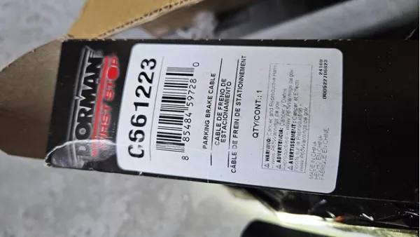 Трос ручника C661223 Dorman