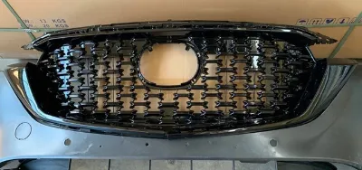 Молдинг решетки радиатора левый MAZDA KSD5507K0