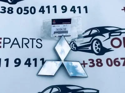 Эмблема решетки радиатора MITSUBISHI 7415A738