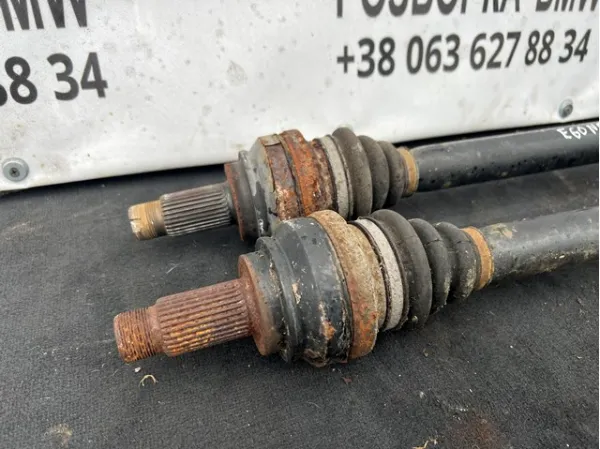 Полуось задняя левая 7529217 BMW