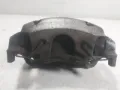 Суппорт тормозной передний левый Ford Focus HM