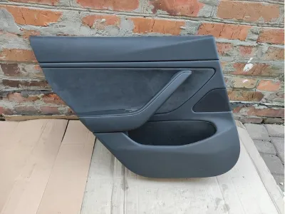 Обшивка (облицовка) внутренняя двери задней левой TESLA 109041301L