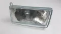 Стекло фары левой VAG 701941105