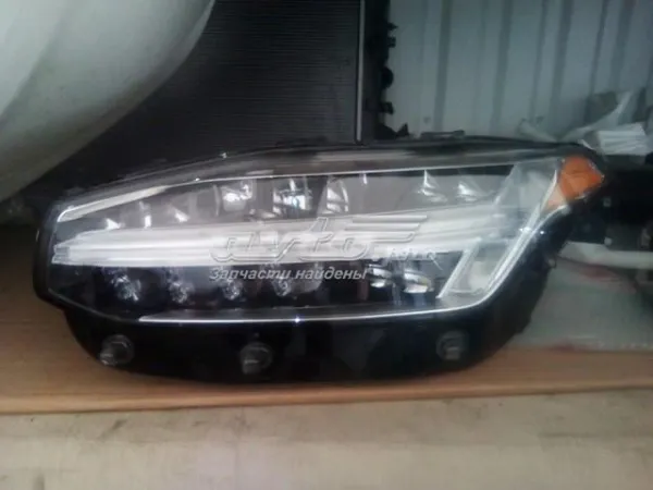 Левая фара 32228686 Volvo