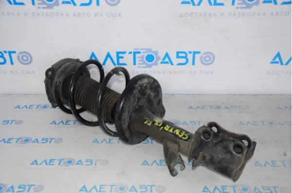 Амортизатор передний левый E43039AM0B Nissan/Infiniti