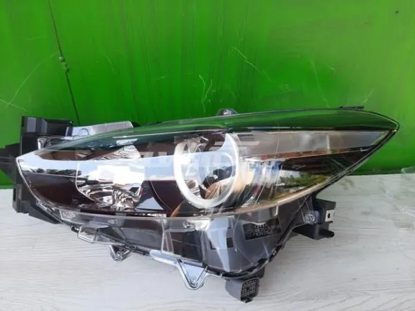 Левая фара B63C51040 Mazda