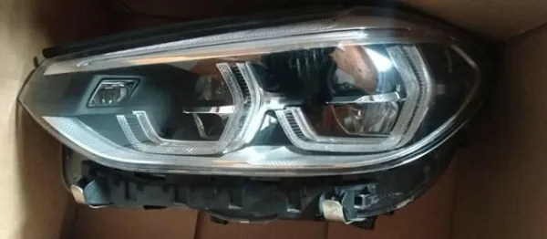 Левая фара 8739657 BMW