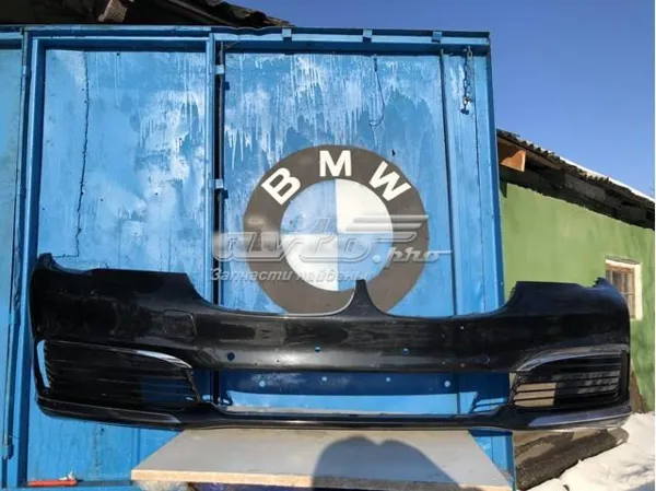 Передний бампер 51117402811 BMW