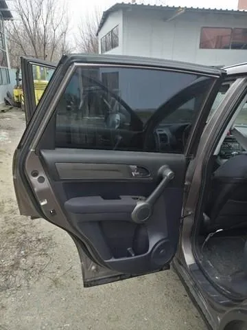 Обшивка (облицовка) внутренняя двери задней левой HONDA 83751SWWE21ZA